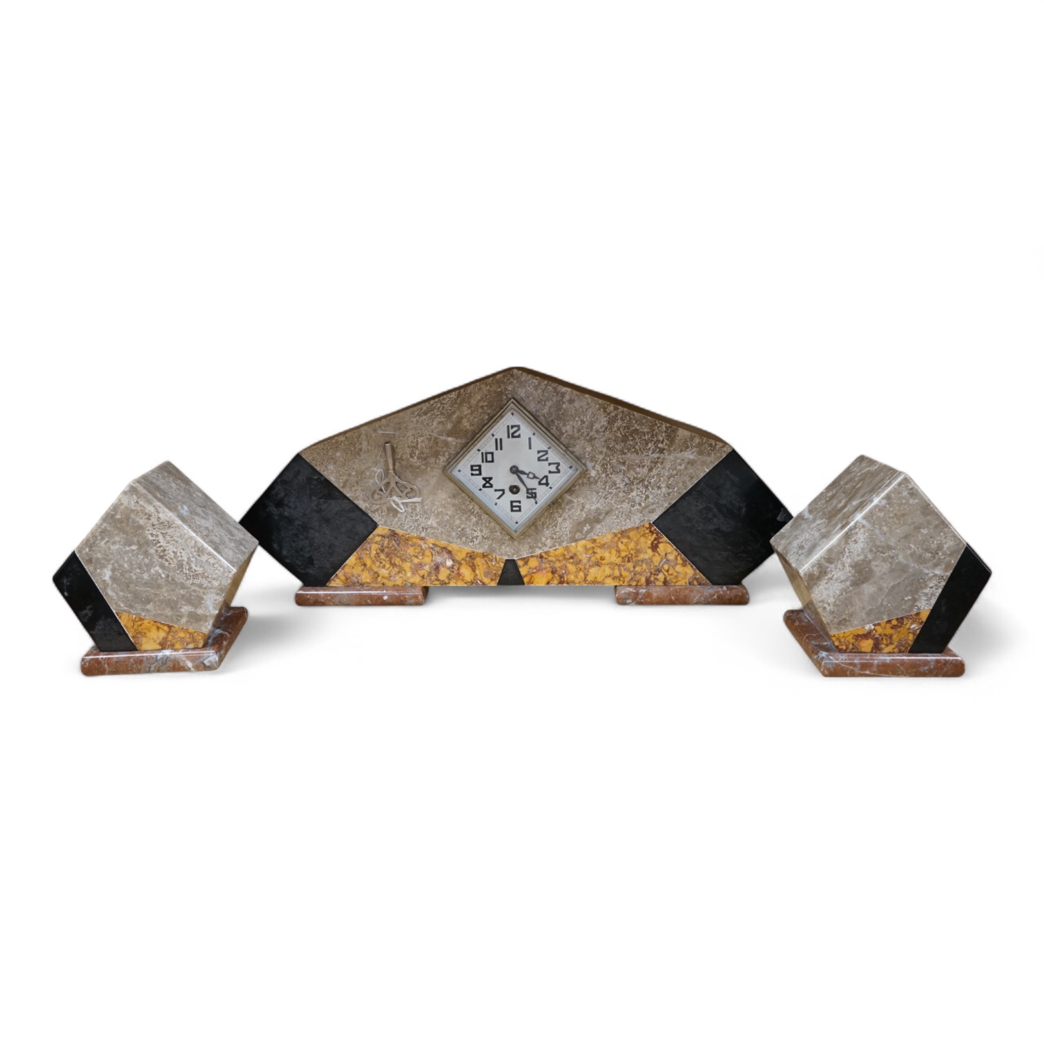 An Art Deco four colour marble clock garniture, with key